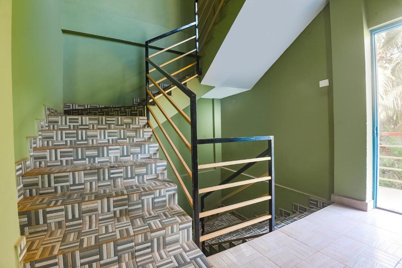 Fabexpress The Voyage Hotel Morjim Esterno foto